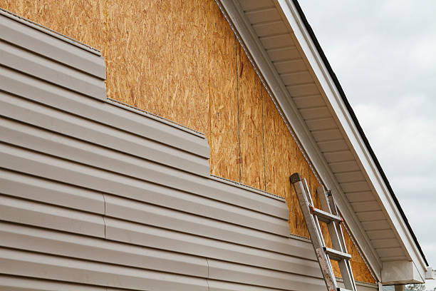 Professional Siding technician working in Brookville, OH